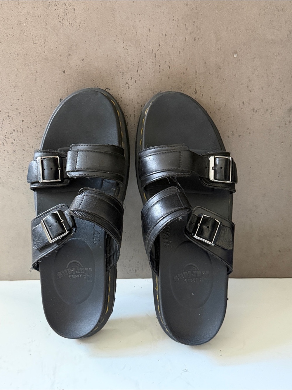Dr. Martens Black Leather Double-Strap Sandals with Yellow Stitching